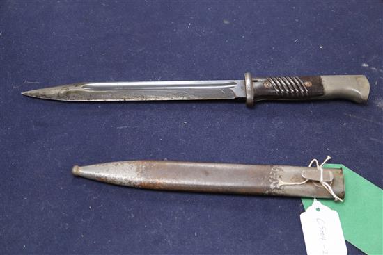 A WWII Third Reich Manser K98 bayonet and scabbard S.817, code WA 883